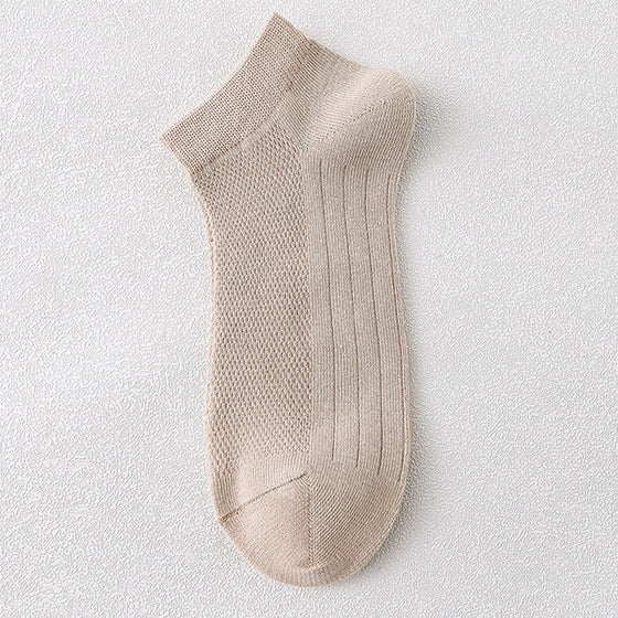 Herrstrumpor i andningsbart material för att motverka dålig lukt