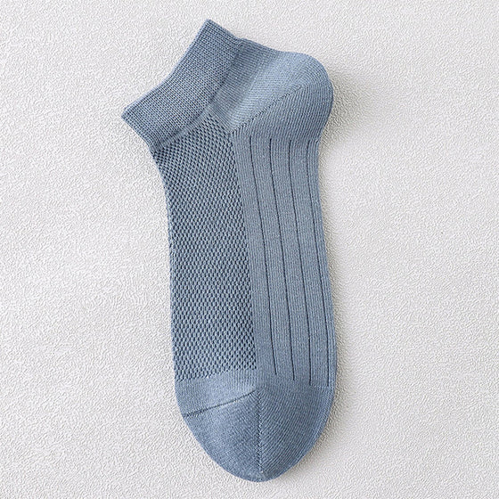 Herrstrumpor i andningsbart material för att motverka dålig lukt