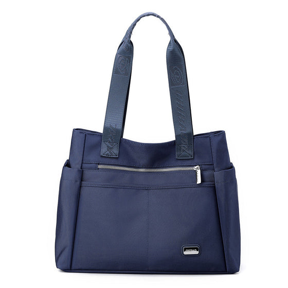 Lätt matchande vattentät axelväska