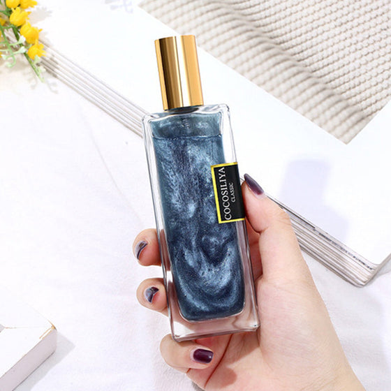 Parfym med varaktig doft av förgylld sand